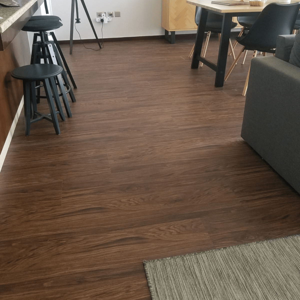 Cocoa Walnut Flooring Valiant LVT Flooring Shines with 0.5mm Wear Layer - AlUmaima Interiors