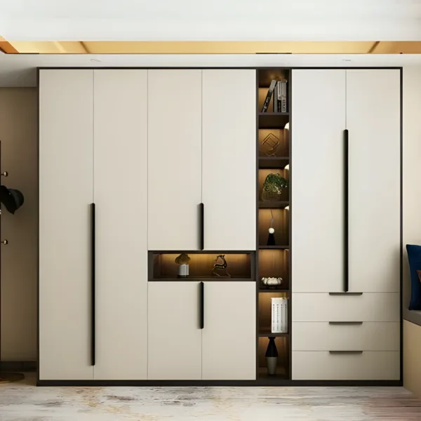 AlUmaima Interiors cream bespoke wardrobe with integrated LED shelving and sleek black handles in a luxury Dubai home.